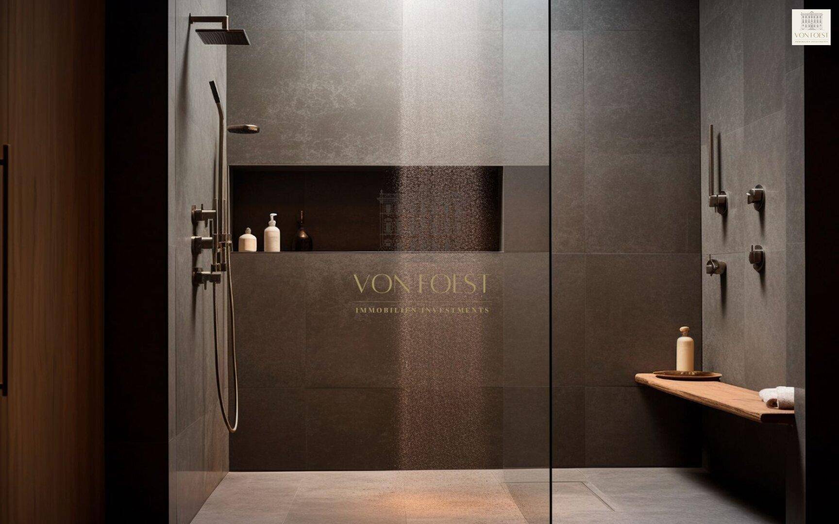 Elegante, moderne Dusche mit dunklen Fliesen, Regenduschkopf und integrierter Ablage.