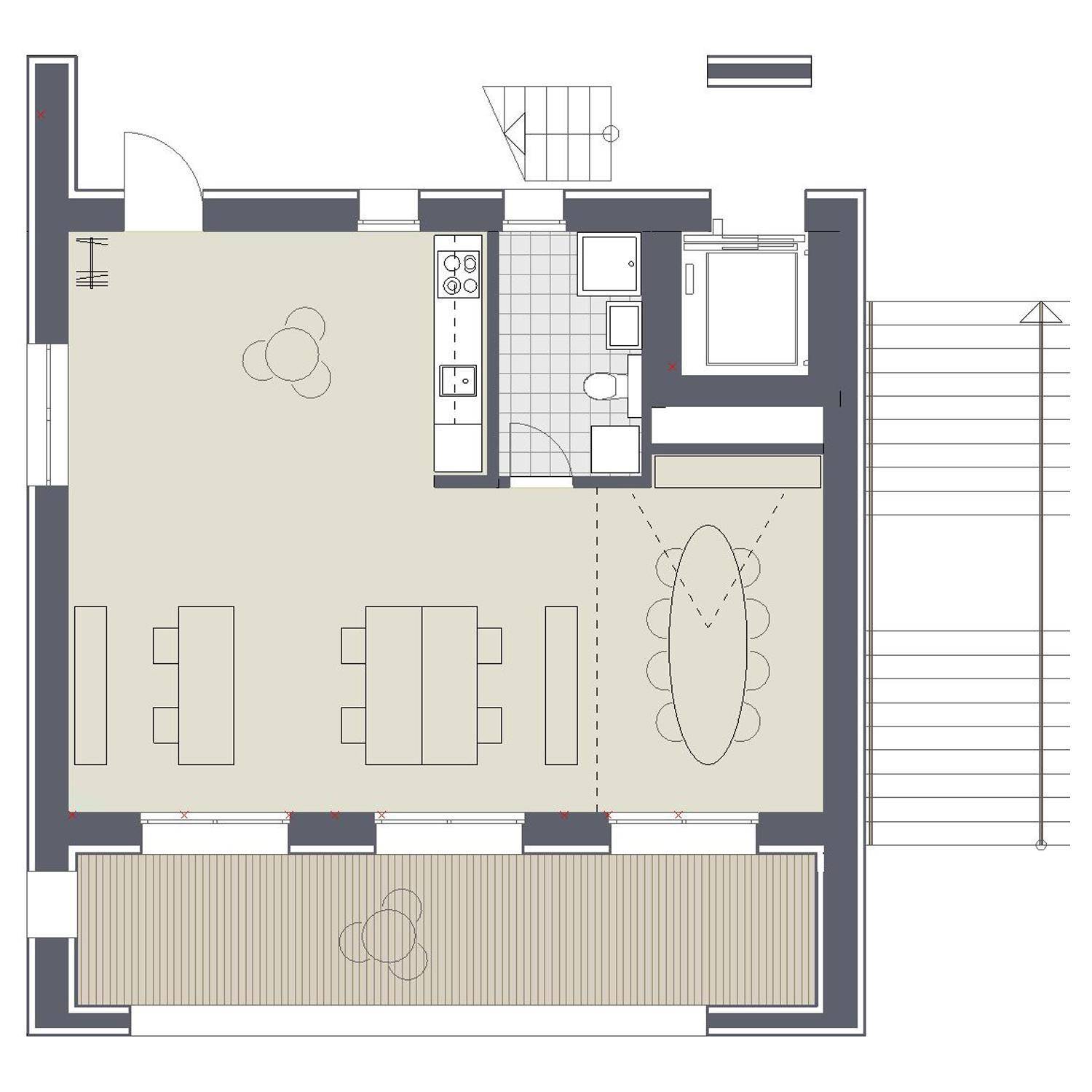 Grundriss mit offenem Wohn- und Essbereich, integrierter Küche, Badezimmer und einer großzügigen Terrasse.