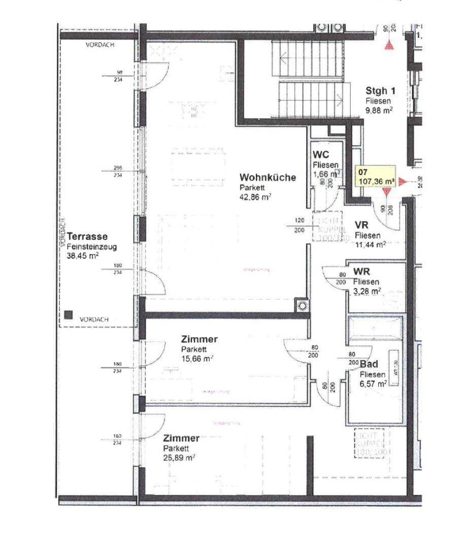 Grundriss einer Wohnung mit großer Terrasse, offener Wohnküche, zwei Zimmern, Bad und separatem WC.