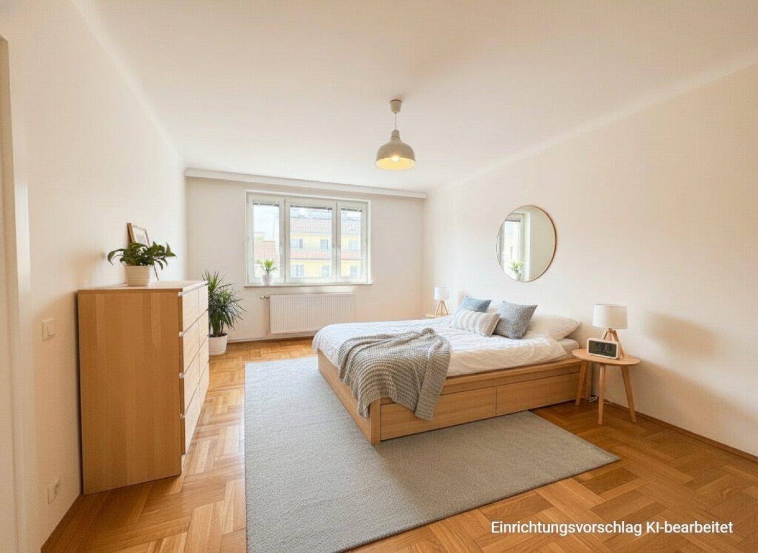 Modern eingerichtetes Schlafzimmer mit Parkettboden, Doppelbett und hellem Mobiliar als Einrichtungsvorschlag.
