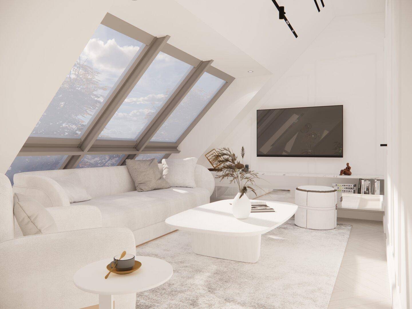 Helles Wohnzimmer im Dachgeschoss mit schrägen Wänden, großen Dachfenstern und moderner Einrichtung.