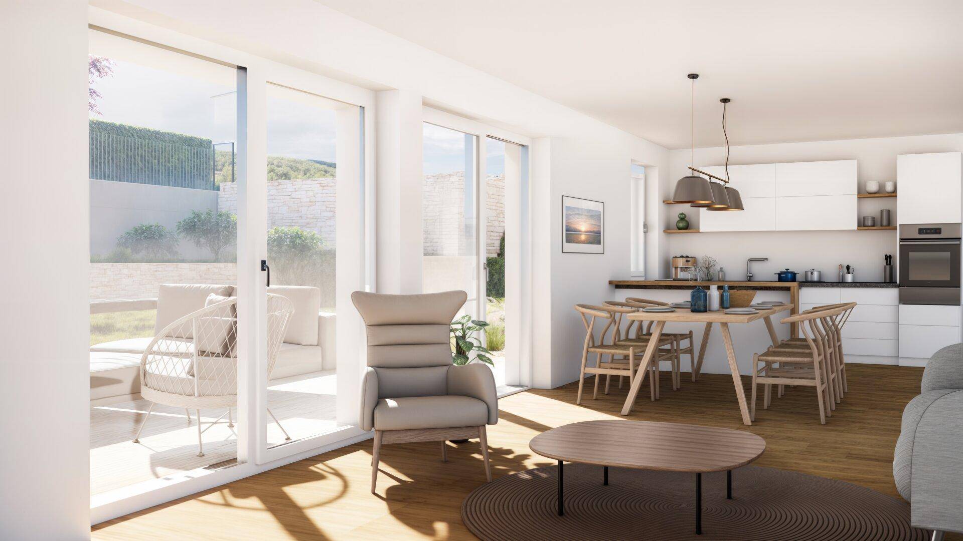Heller offener Wohn-Essbereich mit integrierter Küche und Zugang zur Terrasse.