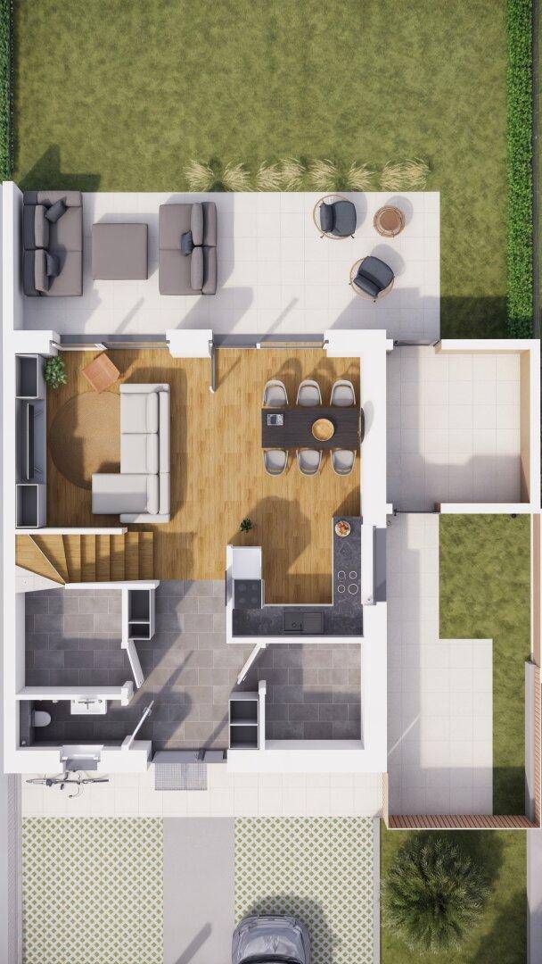 Grundriss des Erdgeschosses mit offenem Wohnbereich, Küche, Gäste-WC und Zugang zur Terrasse und Garten.