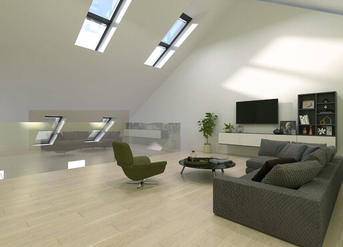 Helles Dachgeschoss-Wohnzimmer mit schrägen Wänden, Dachfenstern und modernem Interieur.