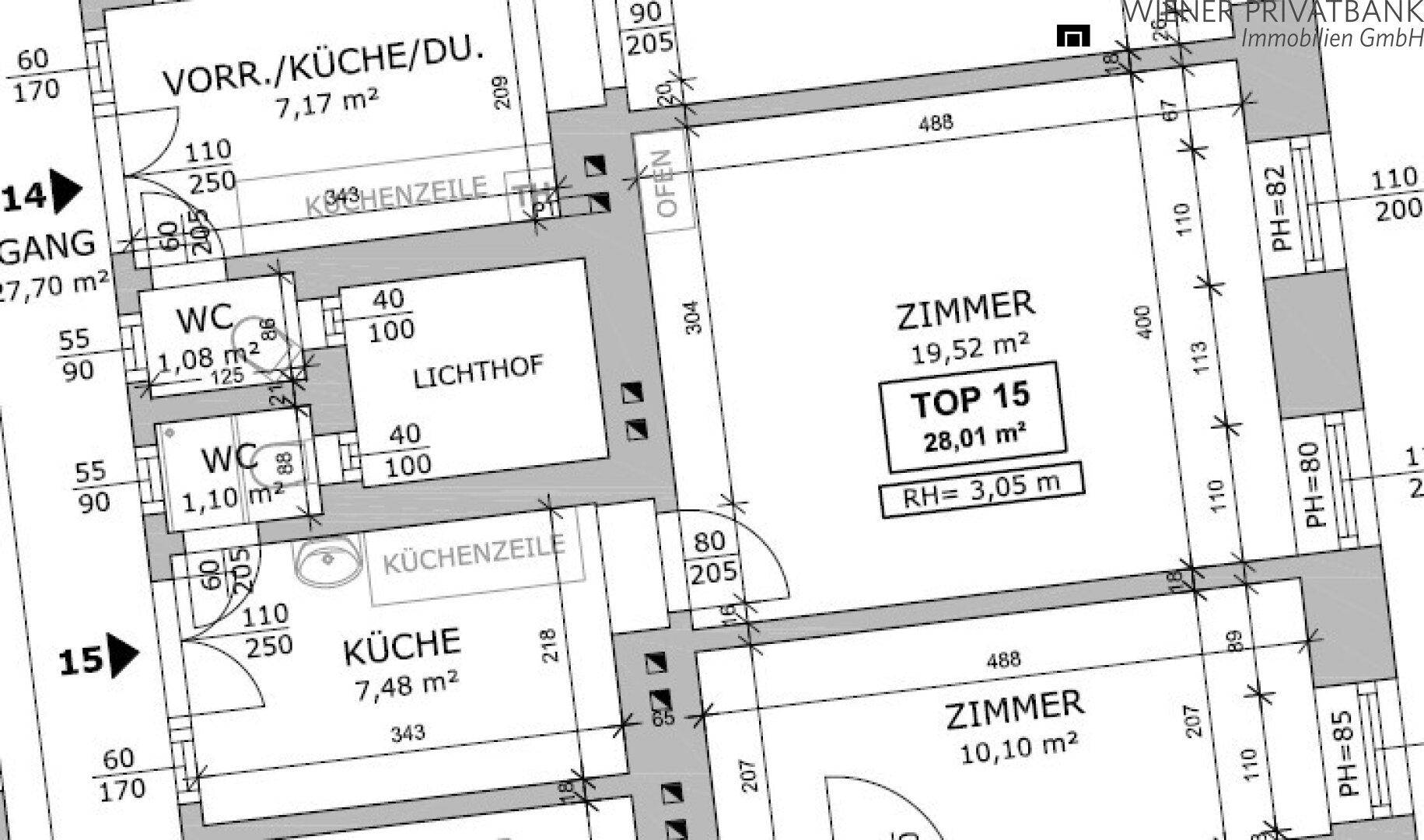 Grundriss einer Wohnung mit zwei Zimmern, Küche, zwei WCs und einem Lichthof.