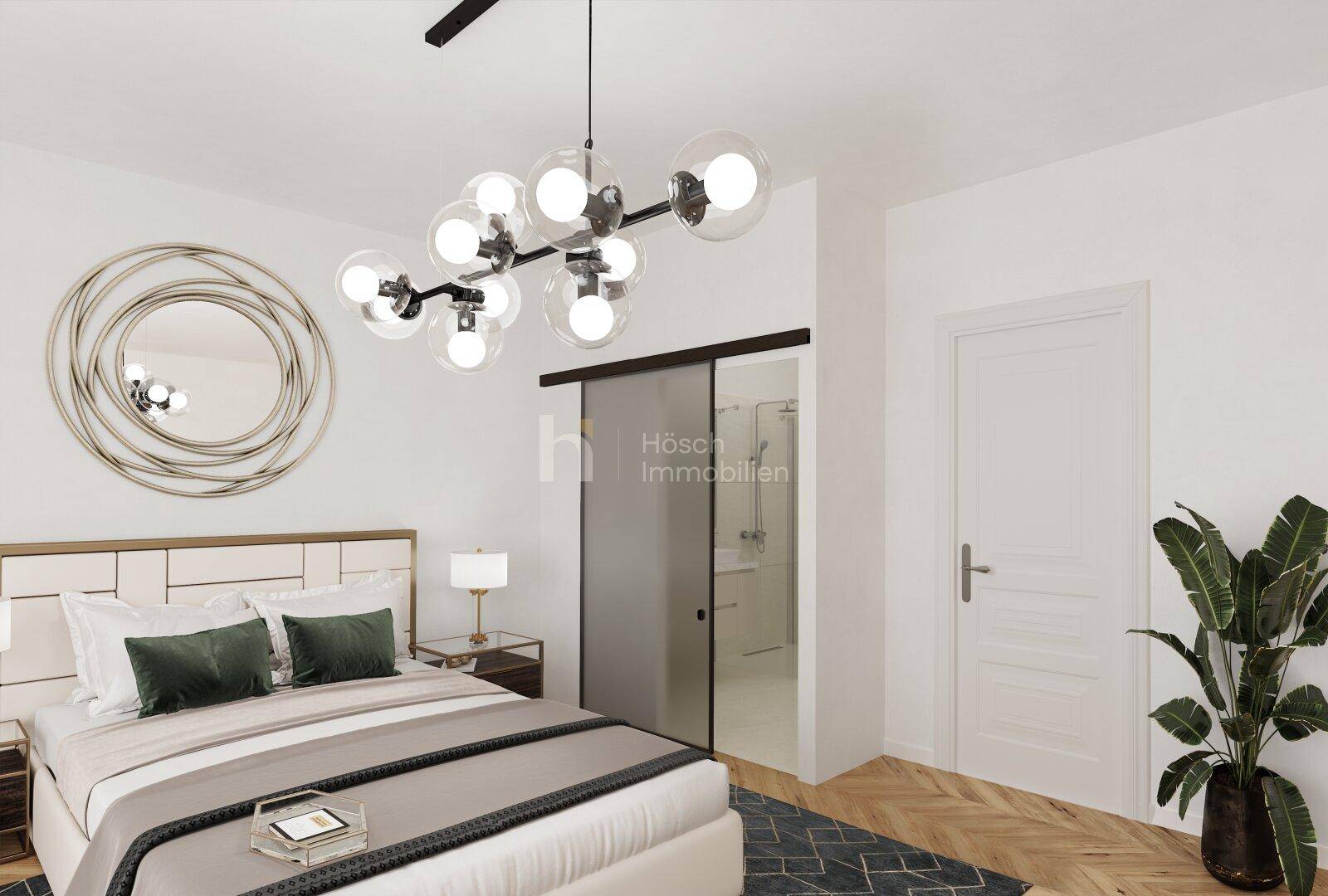 Modernes Schlafzimmer mit Holzboden und Schiebetür zum angrenzenden Badezimmer.