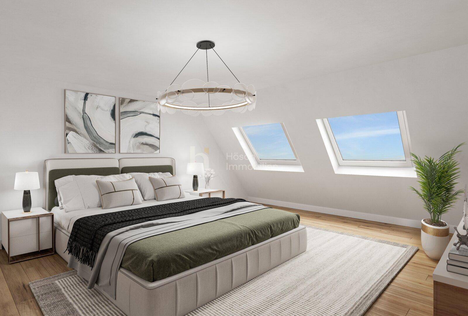 Helles Schlafzimmer im Dachgeschoss mit schrägen Wänden und Dachfenstern.