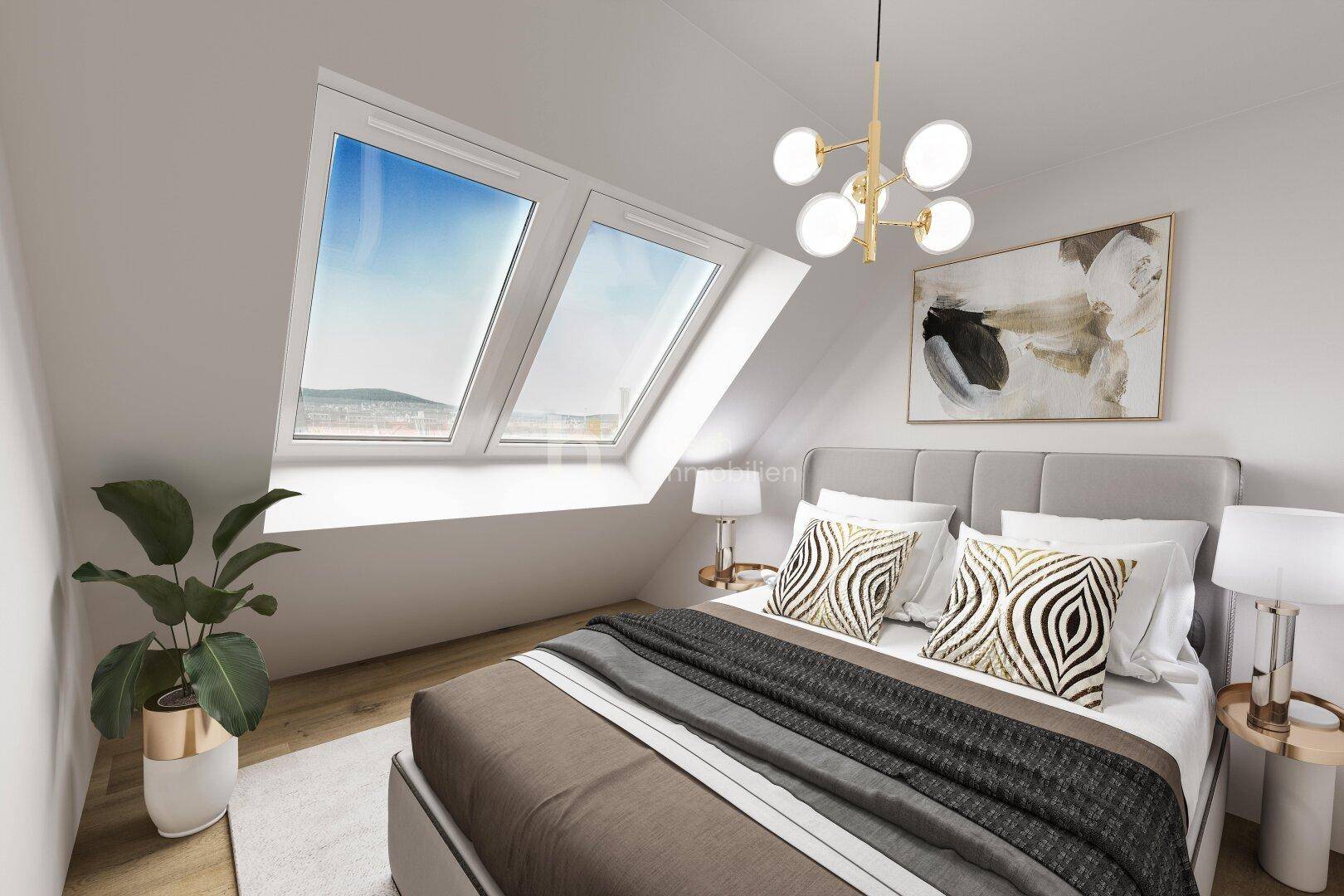 Gemütliches Schlafzimmer im Dachgeschoss mit Dachfenstern und Blick über die Stadt.