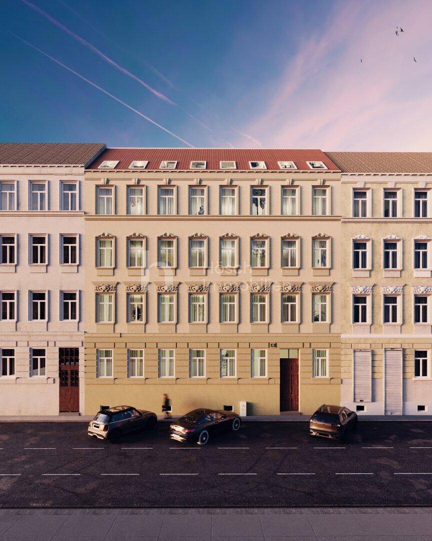 Historische Fassade eines Mehrfamilienhauses an einer städtischen Straße mit geparkten Autos.