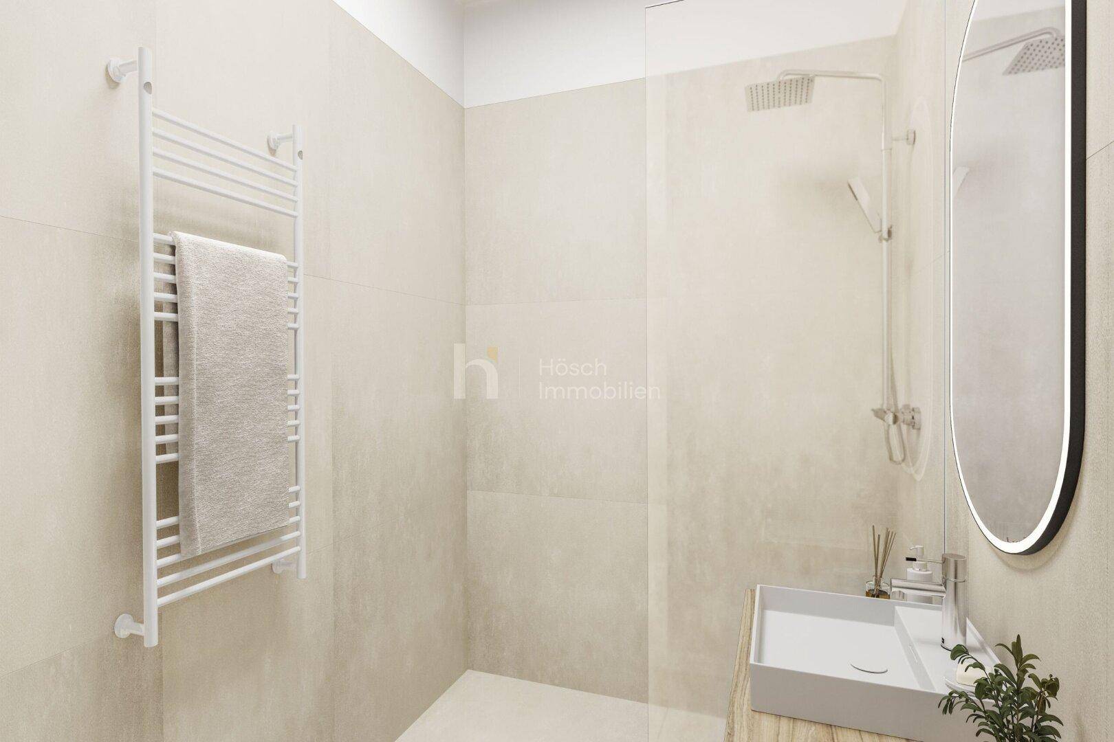 Modernes Badezimmer mit ebenerdiger Dusche, Einzelwaschbecken und beheiztem Handtuchhalter.