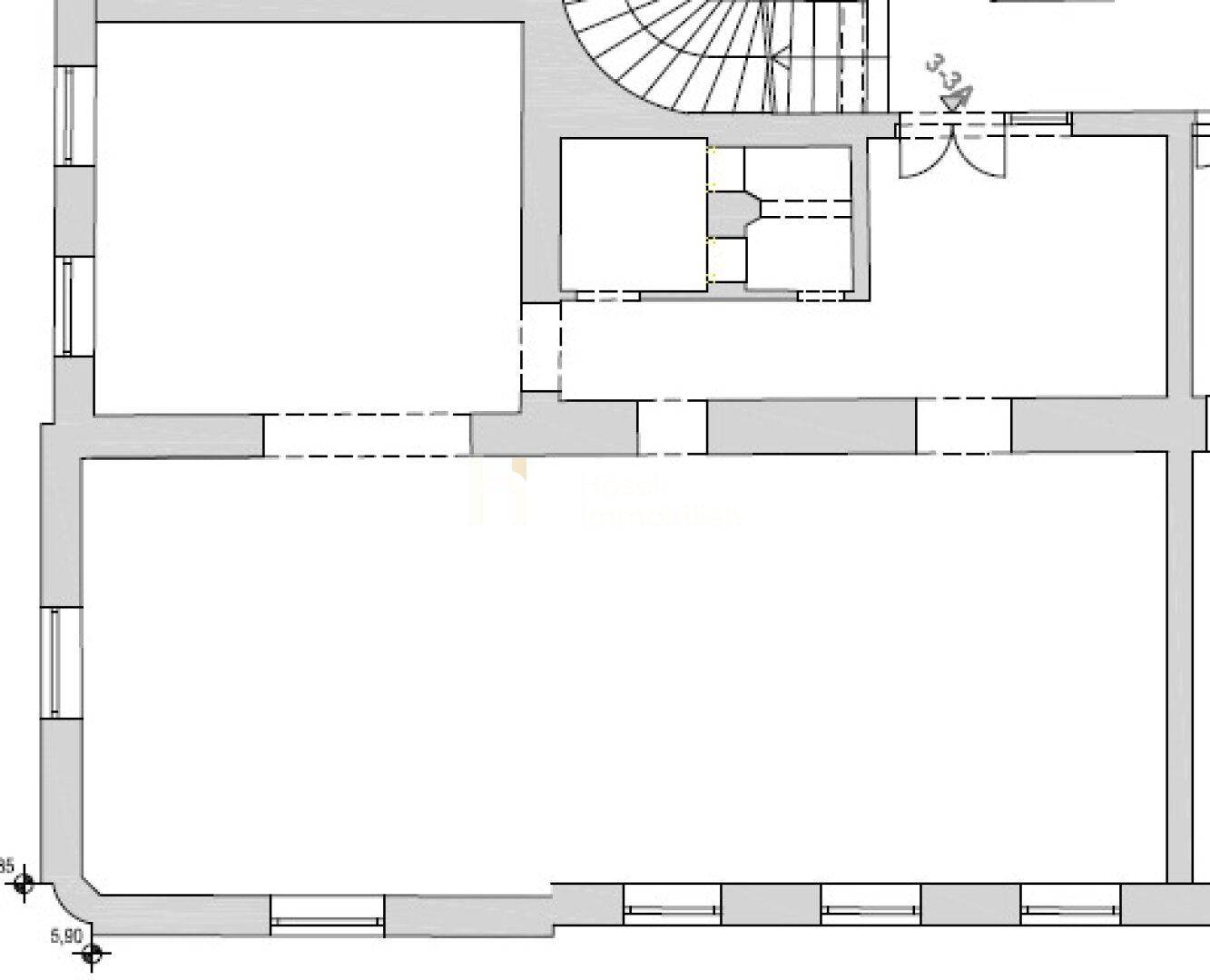 Grundrissplan einer Etage mit großen, offenen Räumen und zahlreichen Fenstern für viel Licht.