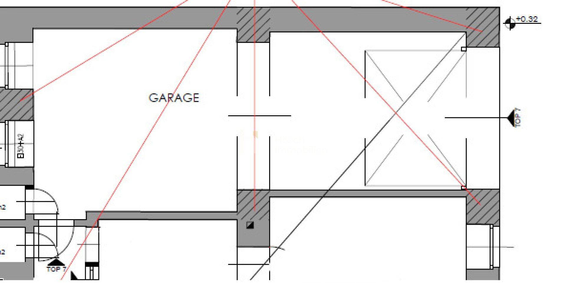 Grundriss zeigt einen Garagenbereich mit angrenzenden Räumen und technischen Linien.