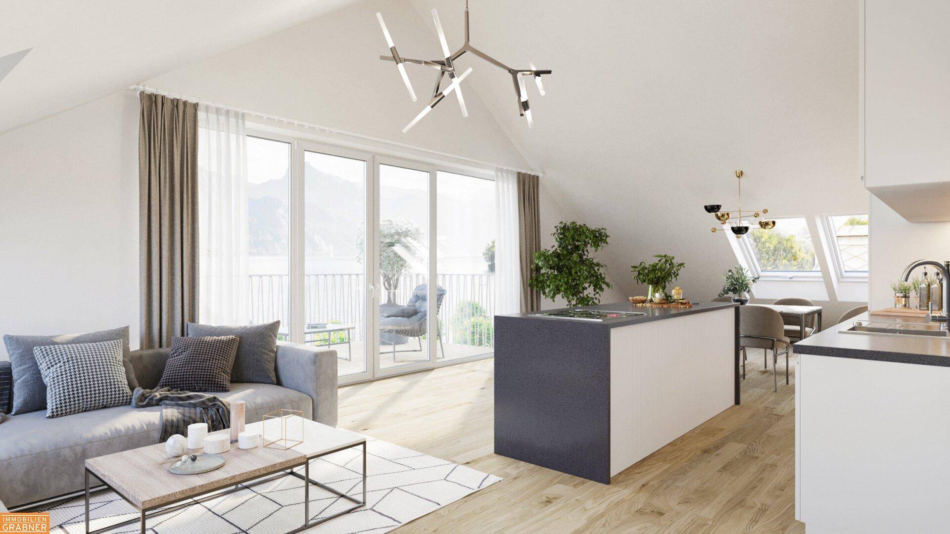 Heller, offener Wohn-Essbereich mit moderner Küche, Holzboden und Zugang zum Balkon mit Berg- und Seeblick.