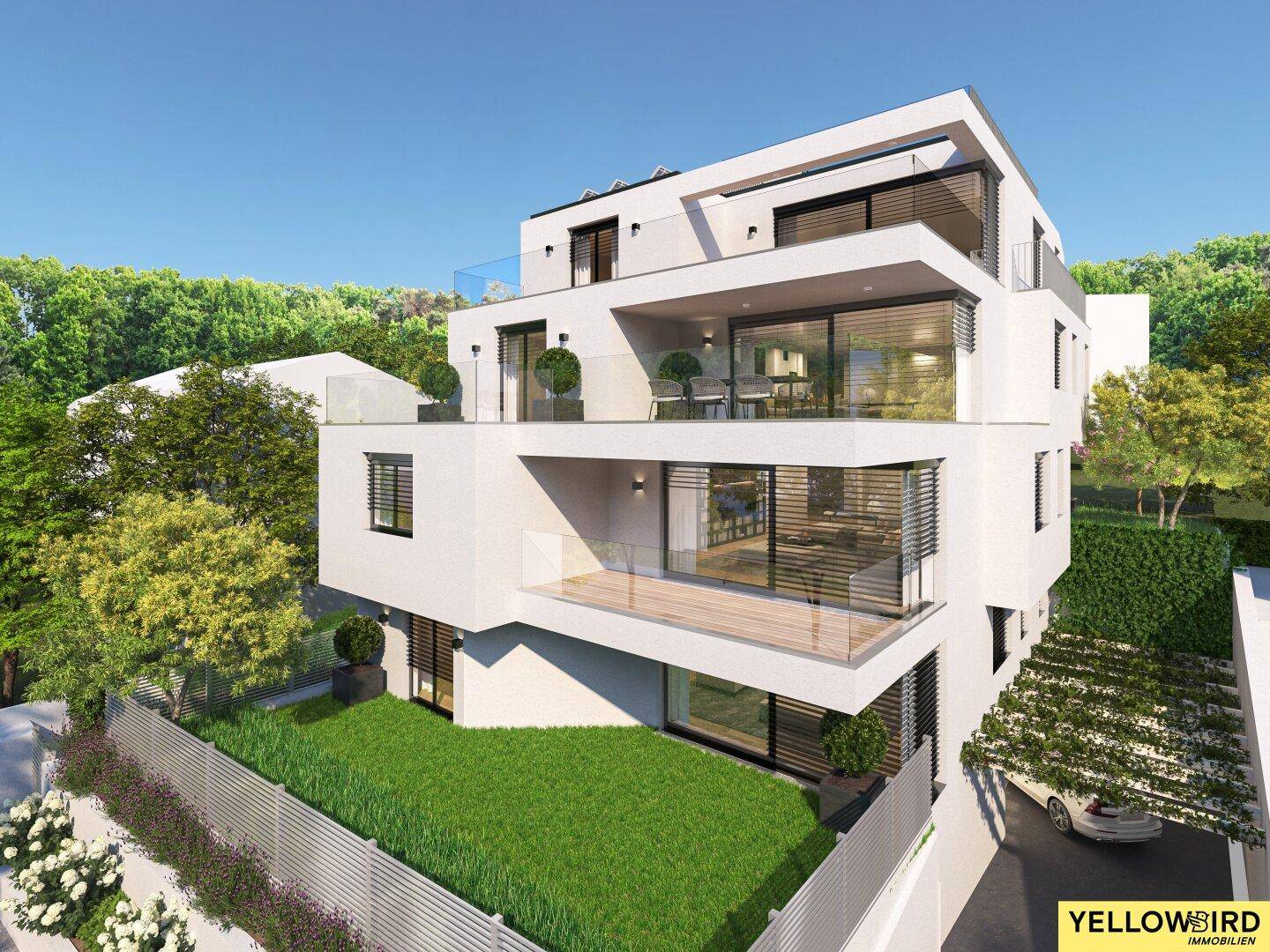 Ansicht eines modernen Wohngebäudes mit mehreren Terrassen, Balkonen und Gartenbereichen.