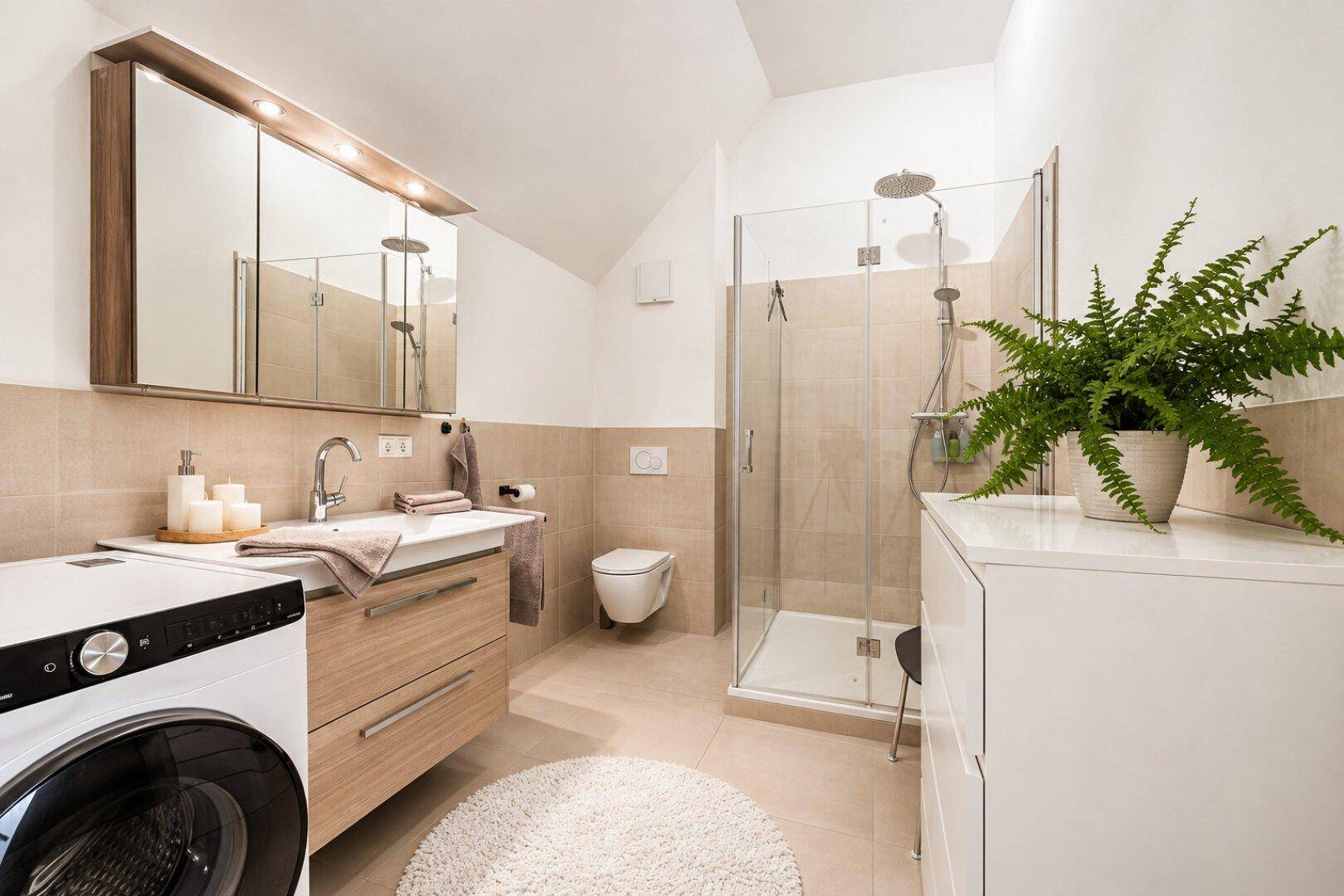 Modernes Badezimmer mit begehbarer Dusche, Waschbeckenunterschrank und Waschmaschine.