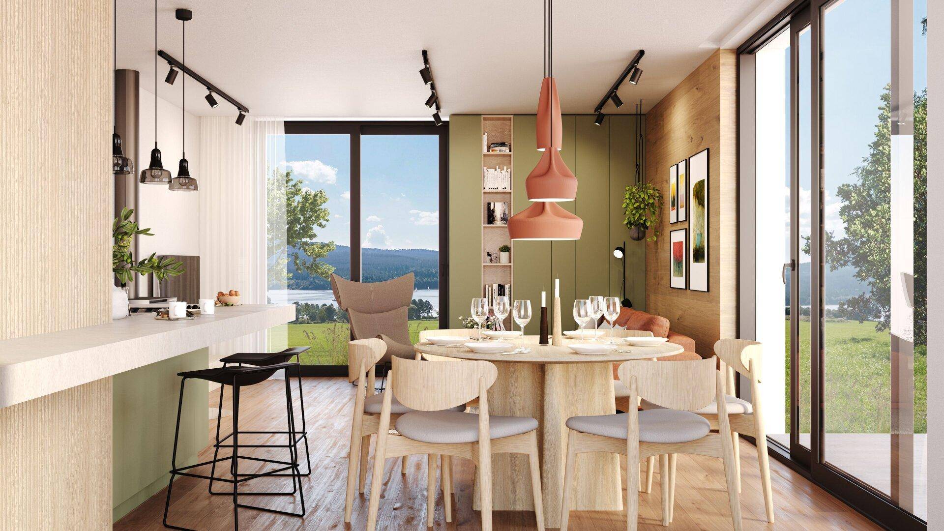 Essbereich mit modernem Design, großen Fenstern und Blick auf die umliegende Landschaft.
