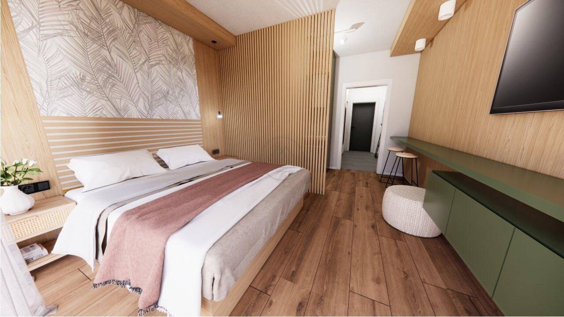 Gemütliches Schlafzimmer mit Holzwänden, großem Bett und modernem Design.