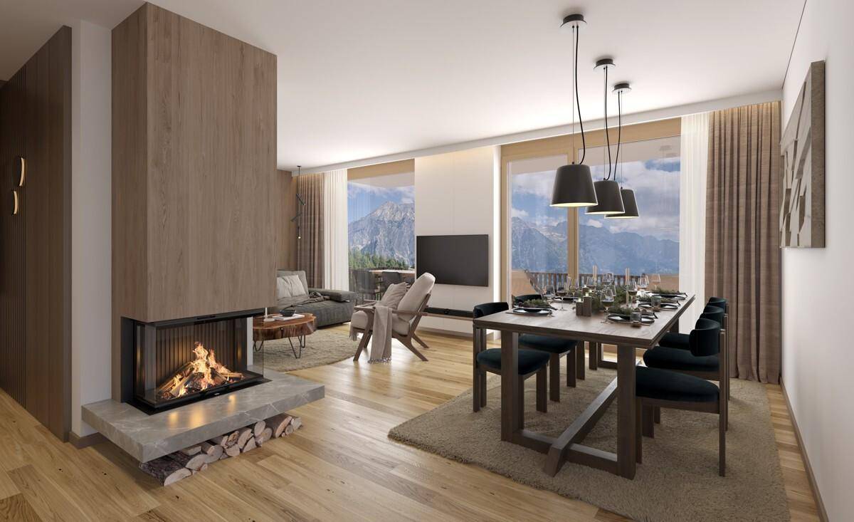 Heller Wohn-Essbereich mit modernem Kamin, Holzboden und Bergblick durch große Fenster.