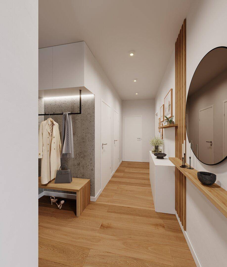 Heller, moderner Flur mit Holzboden, Garderobe, Sitzbank und stilvollem Rundspiegel.