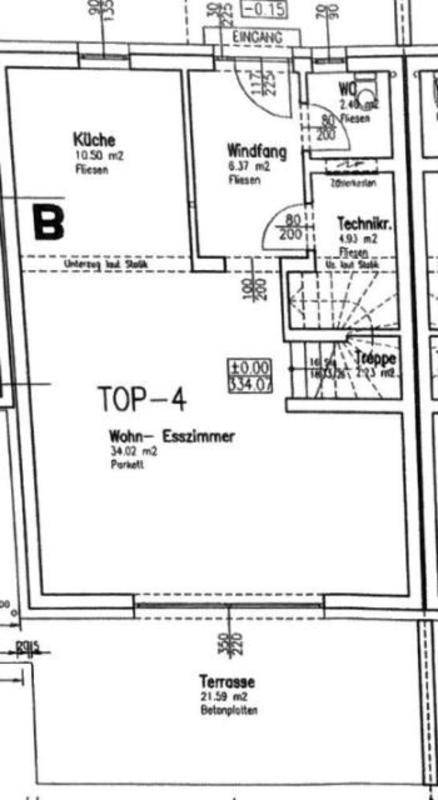 Grundriss des Erdgeschosses mit offener Küche, Wohn-Esszimmer und Terrasse.