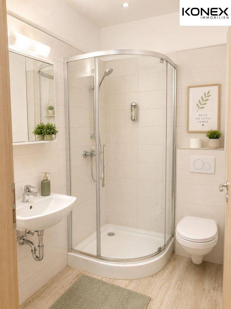 Modernes Badezimmer mit Duschkabine, wandhängendem WC und hellem Fliesenboden.