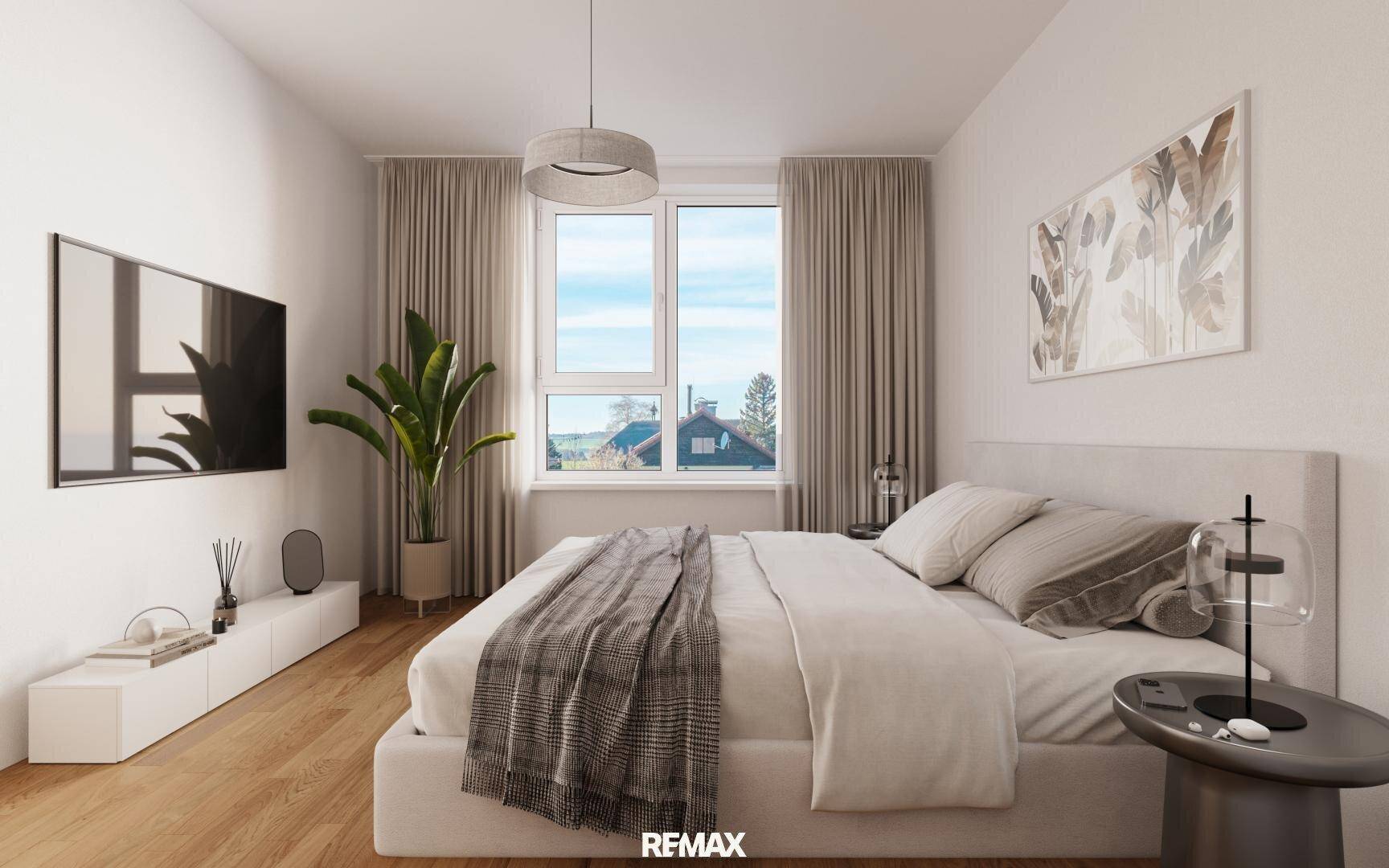 Modernes Schlafzimmer mit großem Bett, Holzboden und viel Tageslicht durch das Fenster.