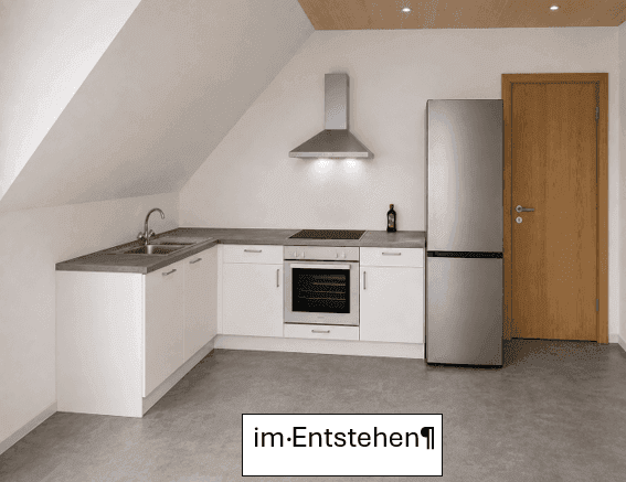 Moderne Küche im Dachgeschoss mit weißen Einbauschränken, grauer Arbeitsplatte und neuen Geräten.