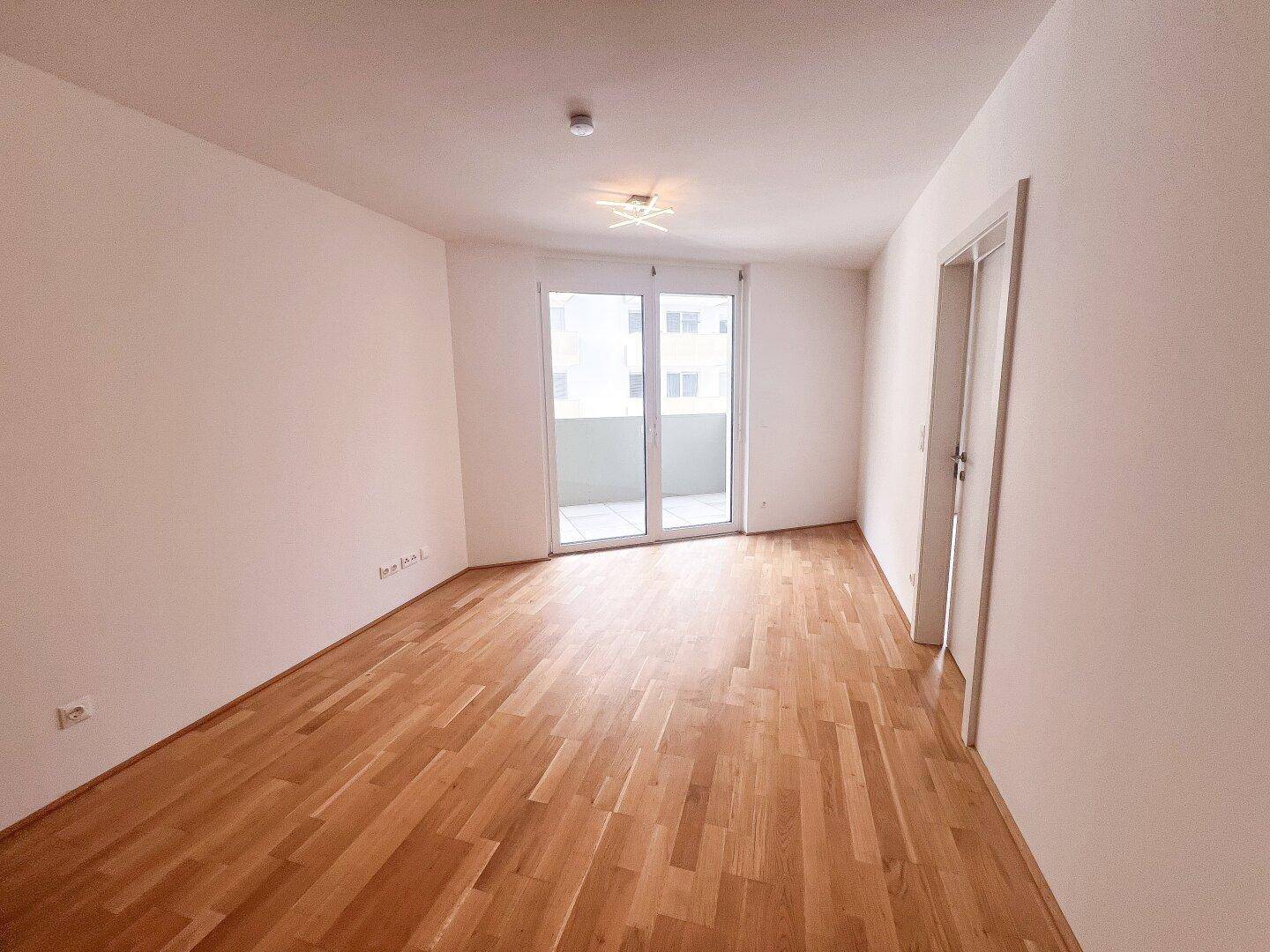 Wohnzimmer mit Küche
