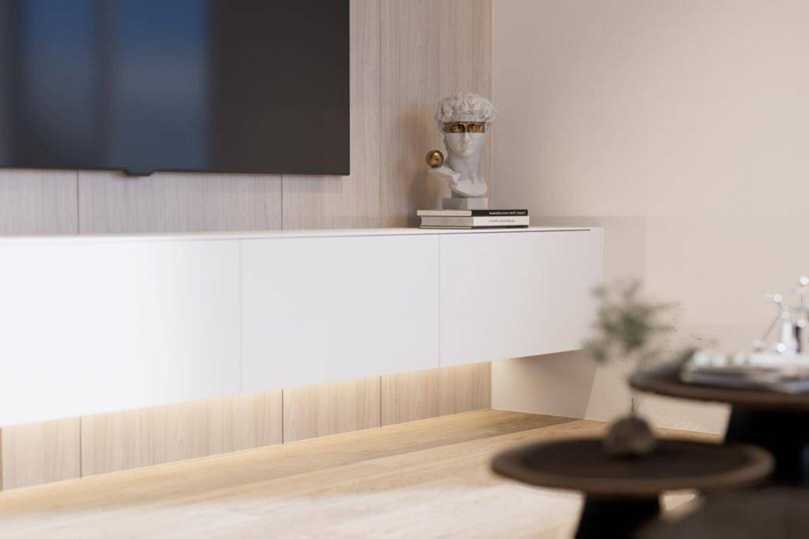 Moderner Wohnbereich mit Wandfernseher, schwebendem Sideboard und minimalistischer Dekoration.