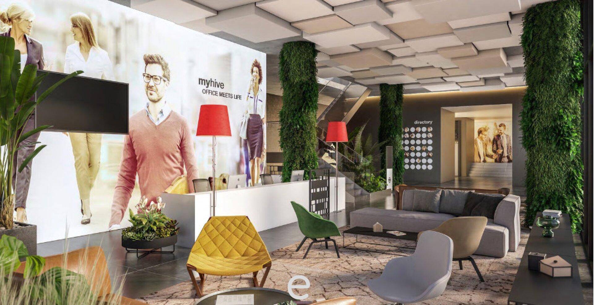 Moderne Bürolounge mit bequemen Sitzgelegenheiten, großen Bildschirmen und vertikalen Gärten, einladend gestaltet.