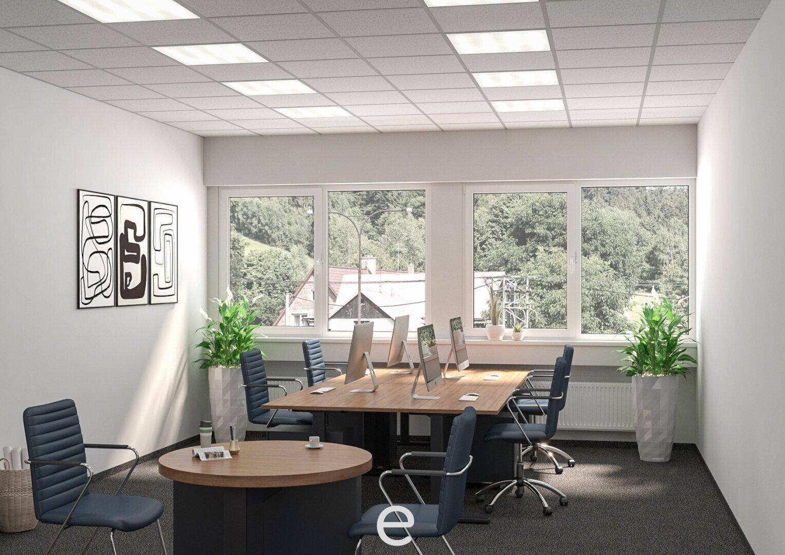 Helles Büro mit mehreren Arbeitsplätzen, einem runden Besprechungstisch und großen Fenstern.