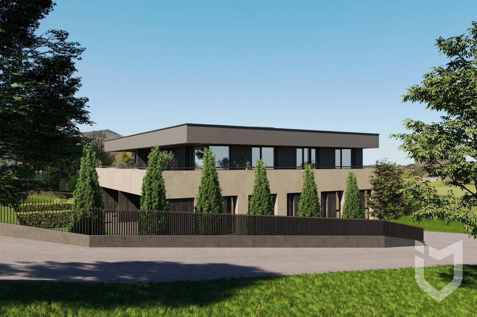 Seitenansicht des modernen Wohngebäudes mit minimalistischer Architektur und grüner Umgebung.