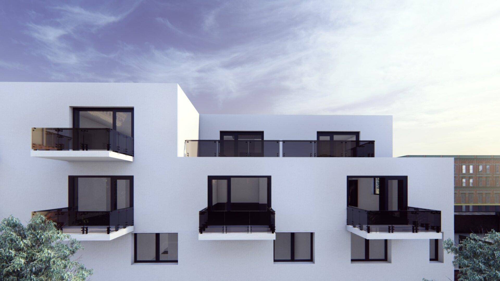 Moderne Wohnanlage mit weißer Fassade, großen Fenstern und Glasbalkonen.