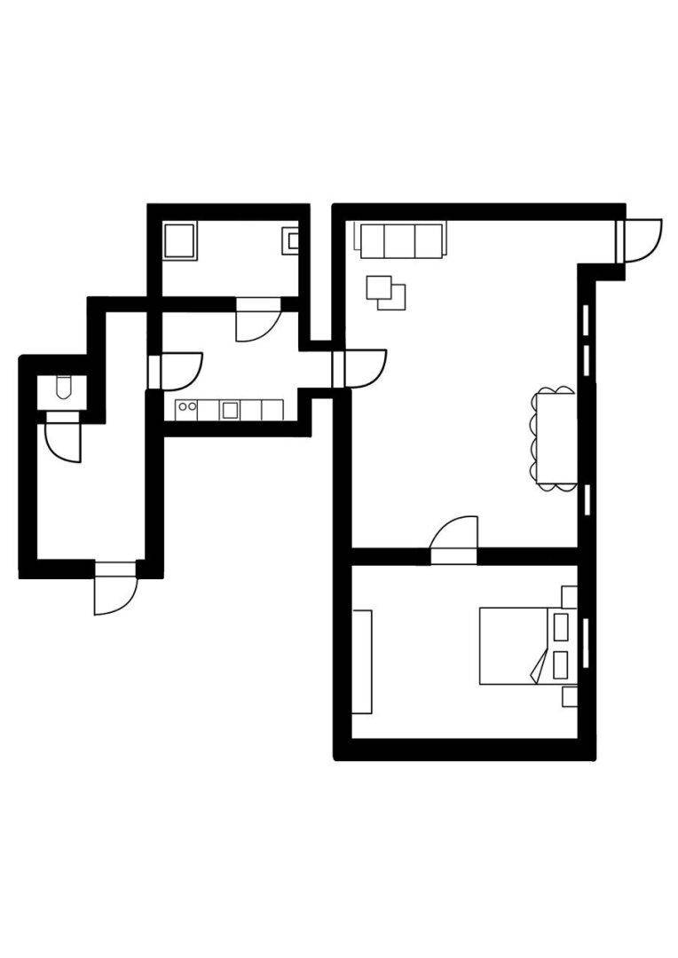 Grundrissplan zeigt die Aufteilung einer Wohnung mit Wohnzimmer, Schlafzimmer und separater Küche.