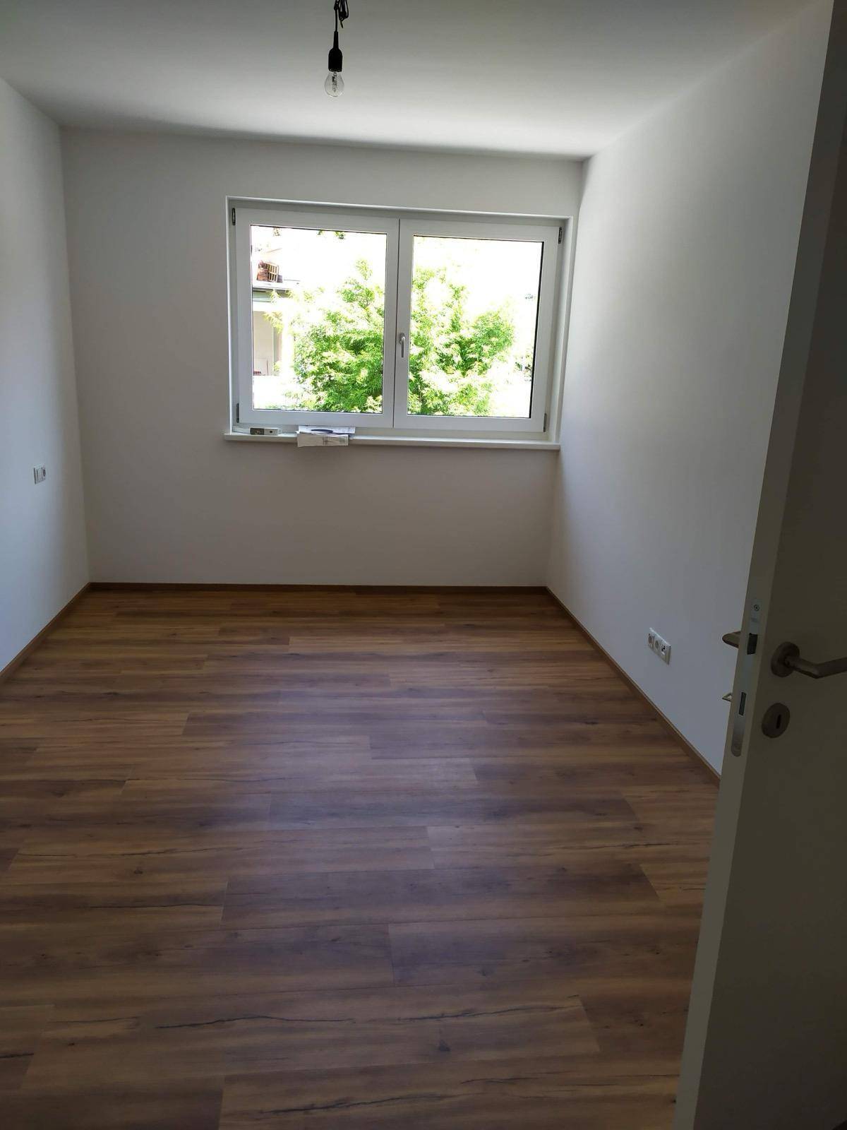 3-Zimmer-Gartenwohnung, Einbauküche, 2 Tiefgaragenstellplätze mit E Lademöglichkeit in Zell - Ansicht 2