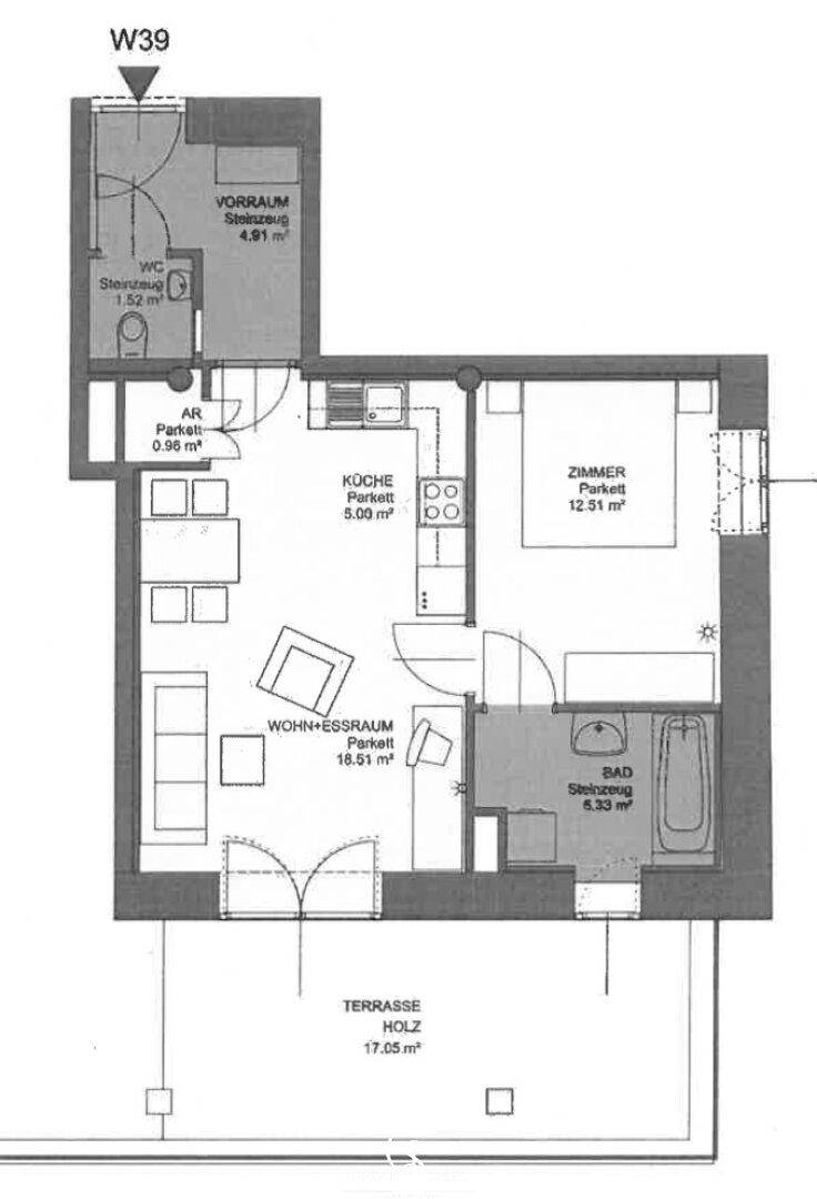 Grundriss der Wohnung W39 mit Wohn-Essraum, Schlafzimmer, Küche und Terrasse.