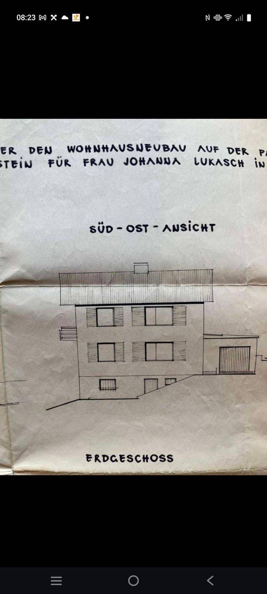 Architektonische Zeichnung der Süd-Ost-Ansicht eines Gebäudes mit Erdgeschoss-Details.