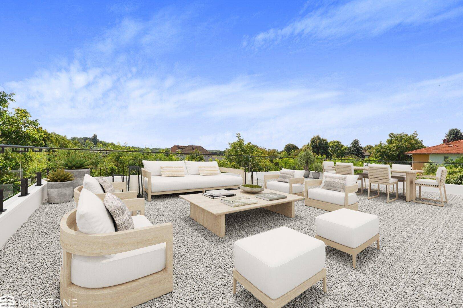 Großzügige Dachterrasse mit moderner Lounge-Möblierung und weitem Blick ins Grüne.