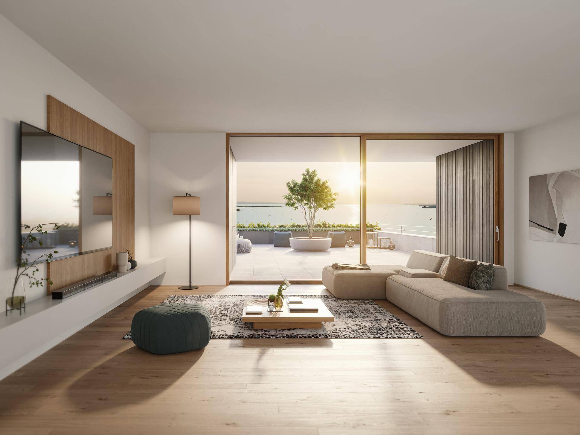 Modernes Wohnzimmer mit Holzboden und direktem Zugang zur Terrasse mit Seeblick.