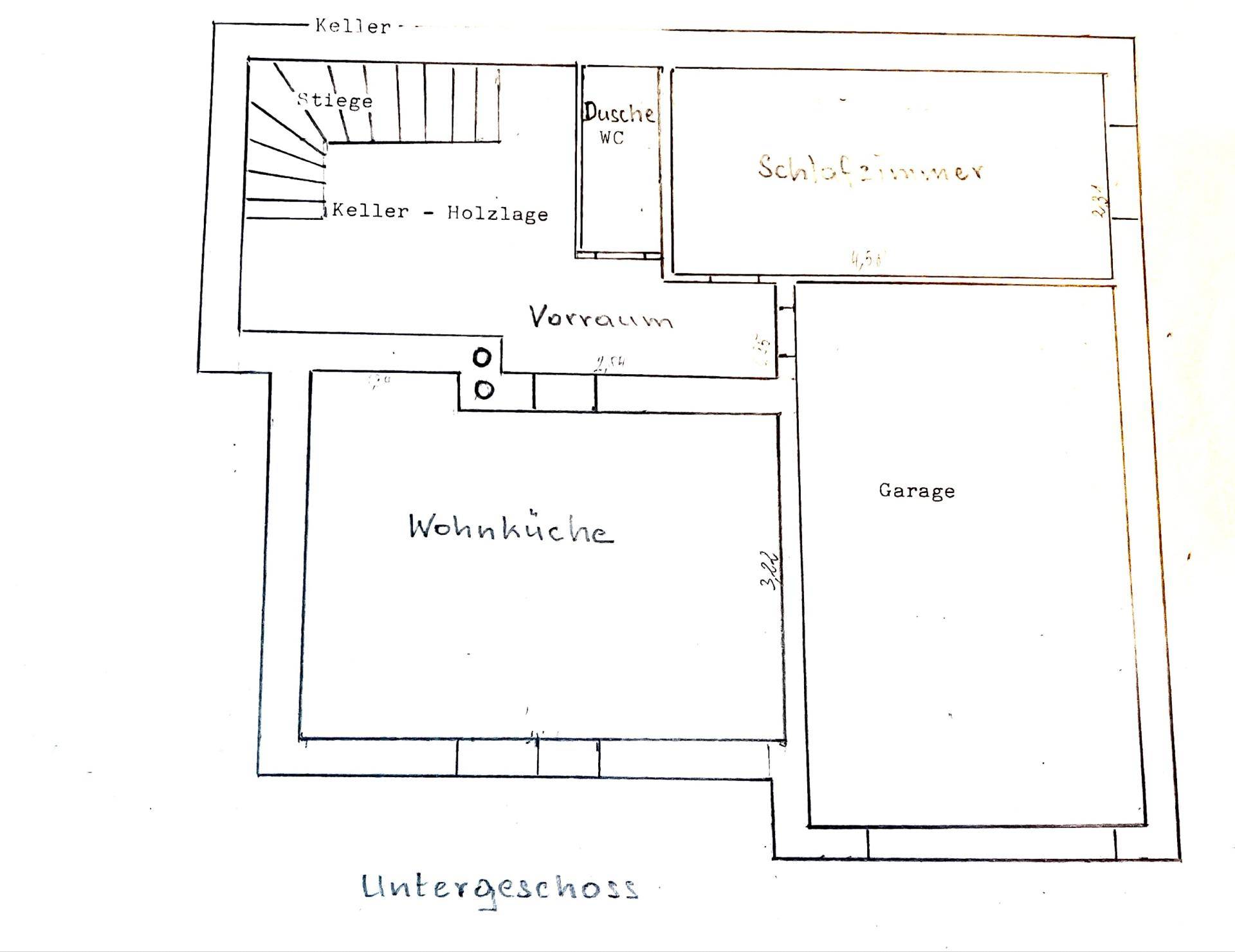 Grundriss des Untergeschosses mit Wohnküche, Schlafzimmer, Garage, Keller und Dusche/WC.