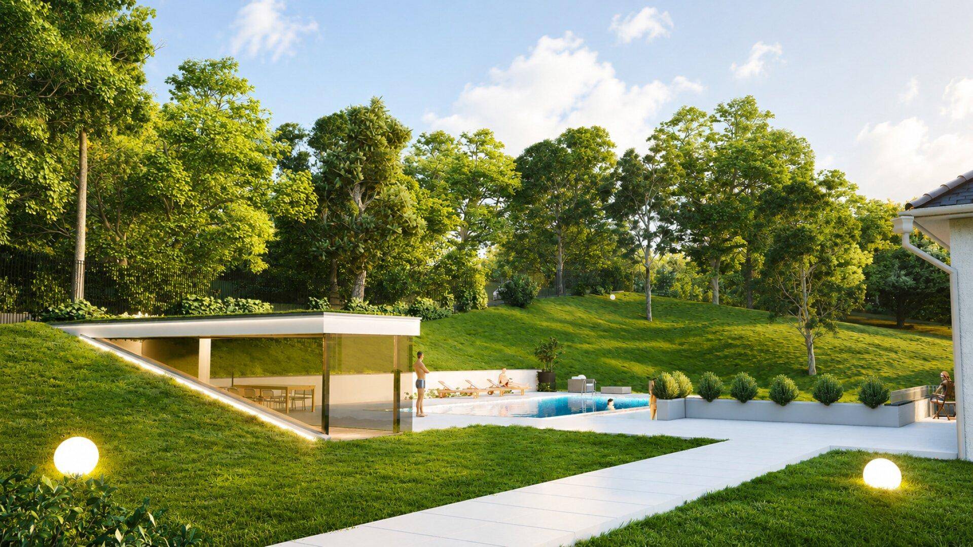 Exklusive Poolanlage mit modernem Glaspavillon und weitläufigen Rasenflächen unter blauem Himmel.