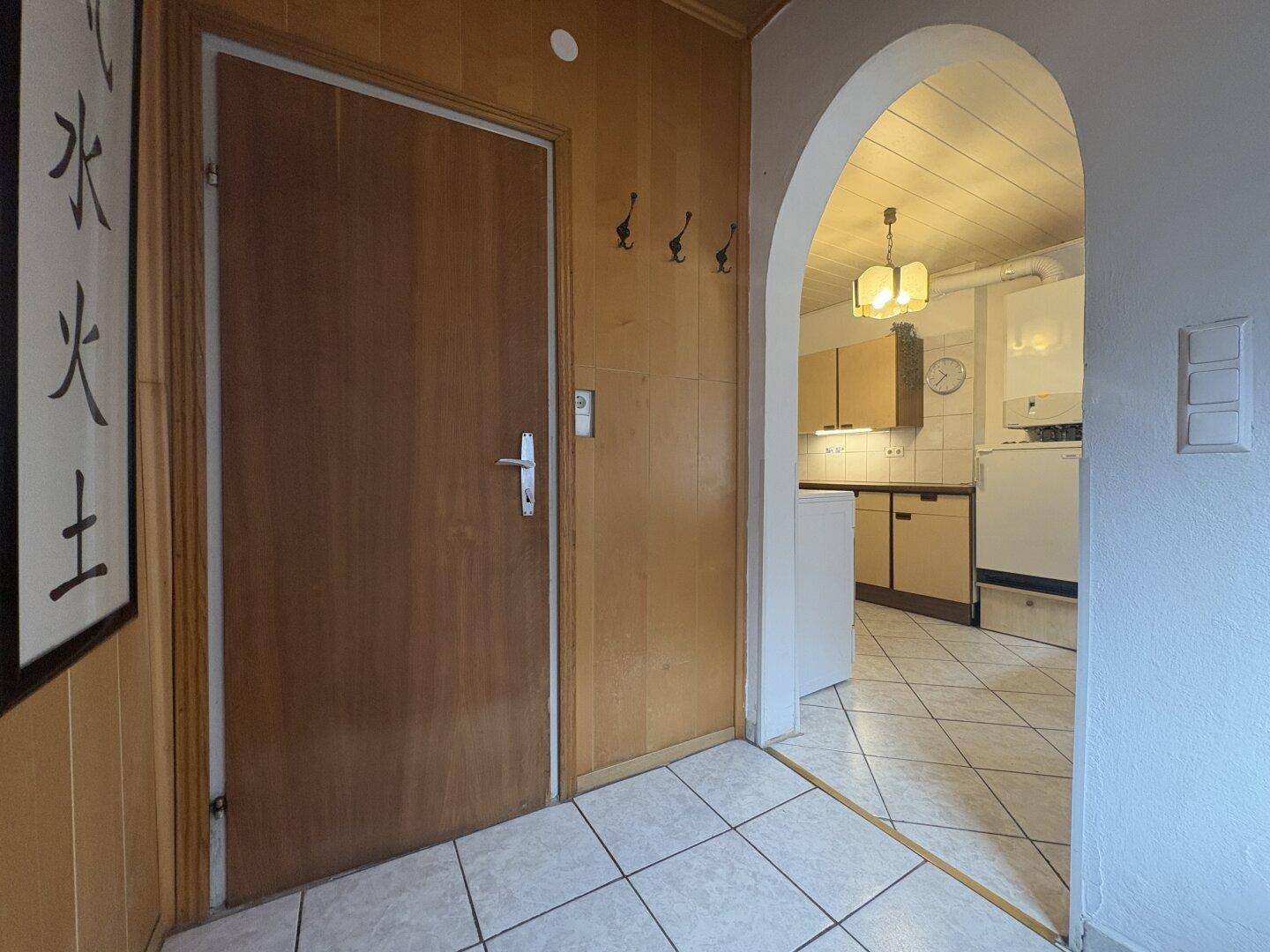 Vorraum (links Schlafzimmer | mitte WC | rechts Küche