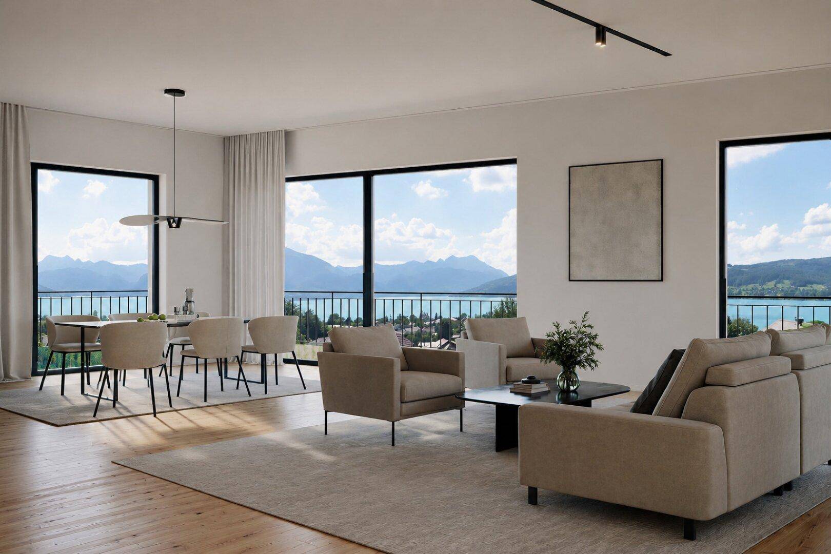 Heller Wohn- und Essbereich mit Seeblick, großen Fenstern und modernem Interieur.