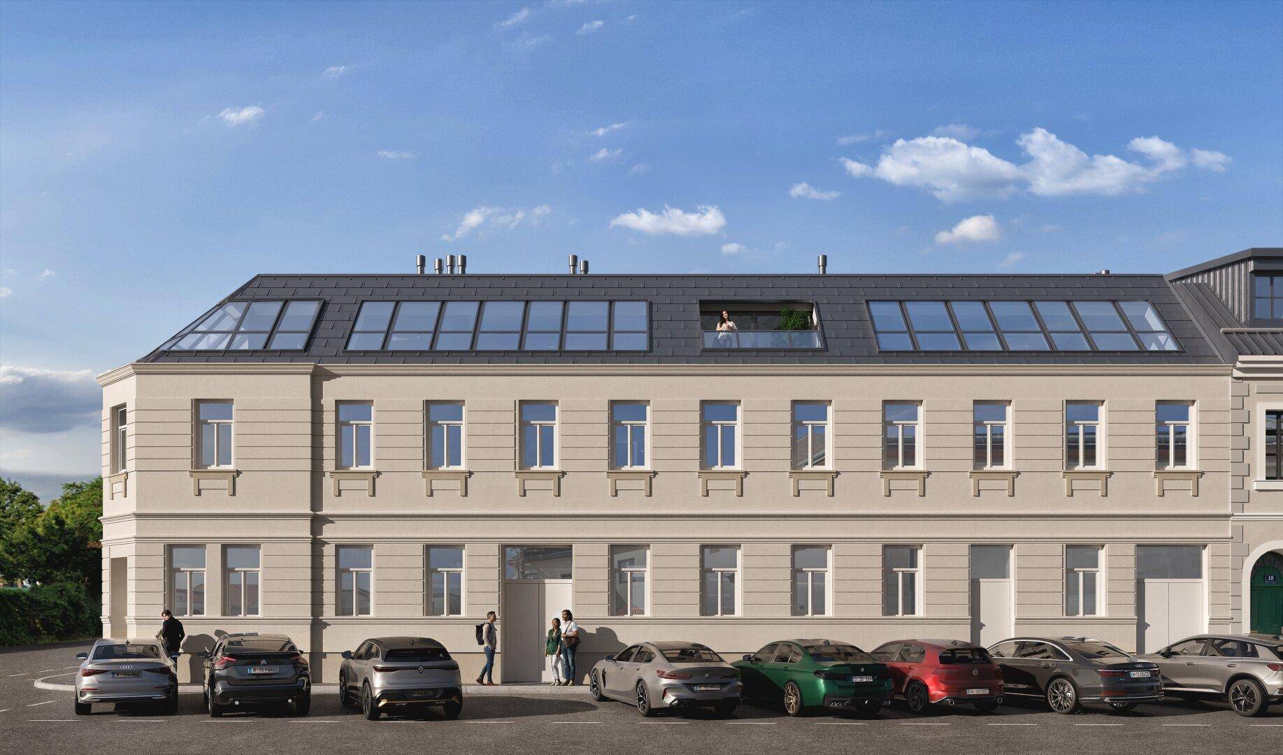 Moderne Gebäudefassade mit Dachfenstern und Parkplätzen vor dem Eingangsbereich.