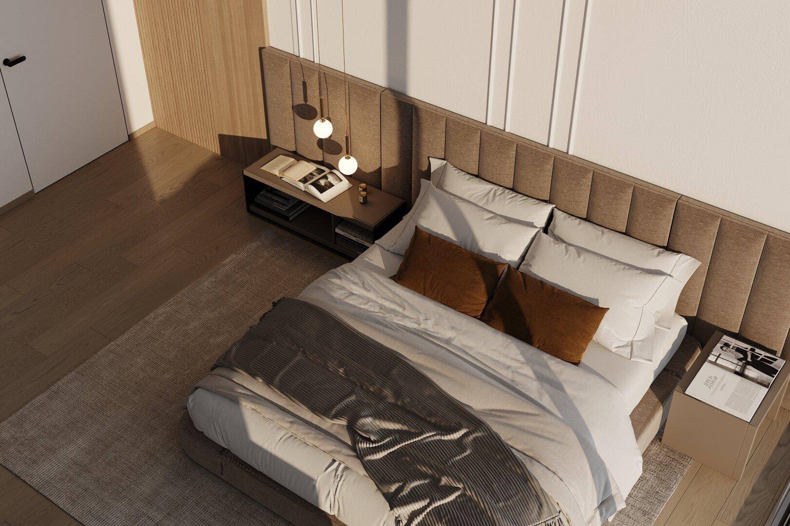 Schlafzimmer von oben gesehen mit großem Bett, Teppich und Holzboden.