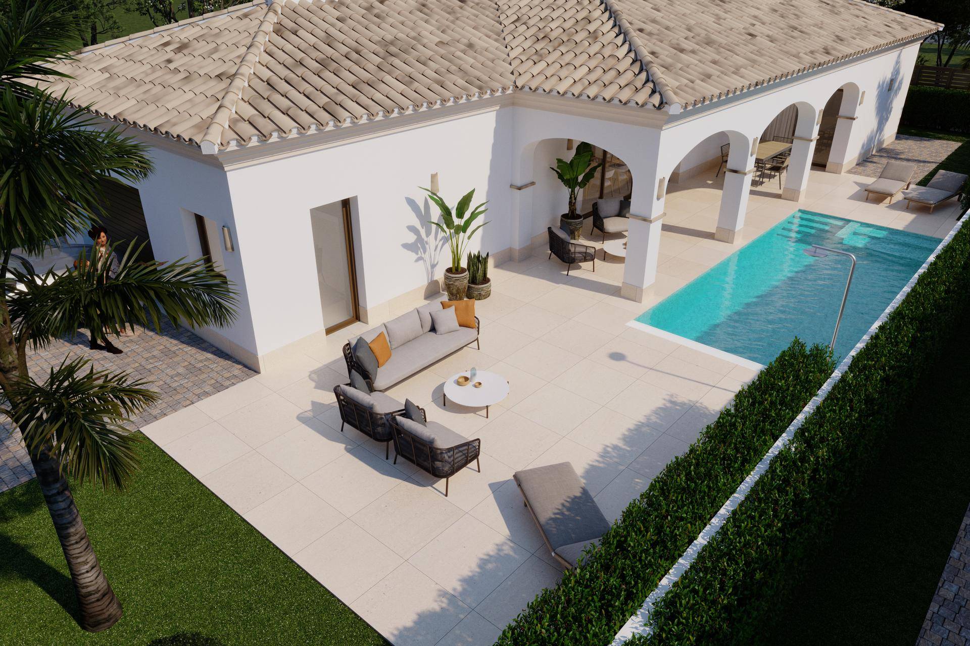 Ansicht von oben auf die Villa mit großzügiger Poollandschaft, Sonnenterrasse und gepflegtem Gartenbereich.