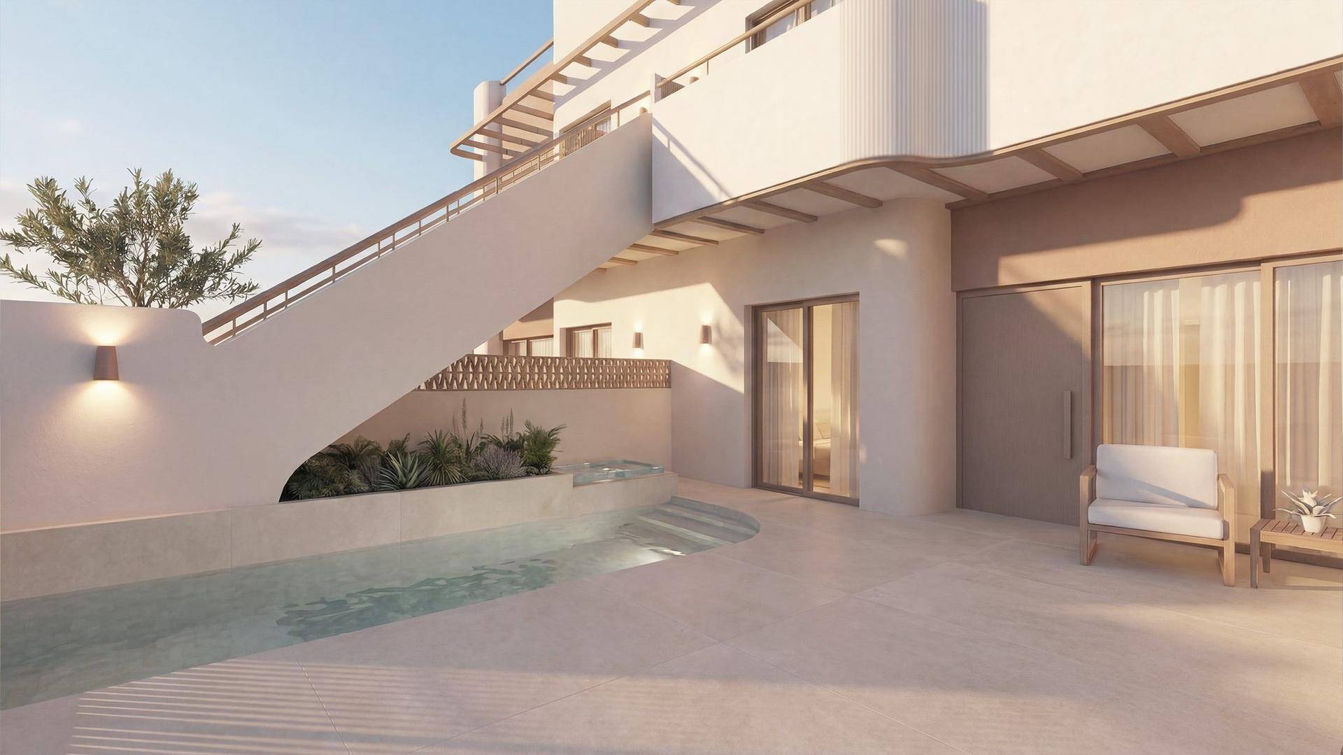 Private Terrasse im Erdgeschoss mit kleinem Pool, Sitzgelegenheiten und Zugang zum Innenbereich.