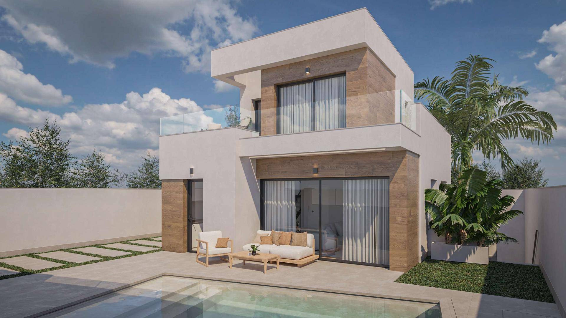Ansicht der modernen Villa mit privatem Pool und Terrasse unter blauem Himmel.