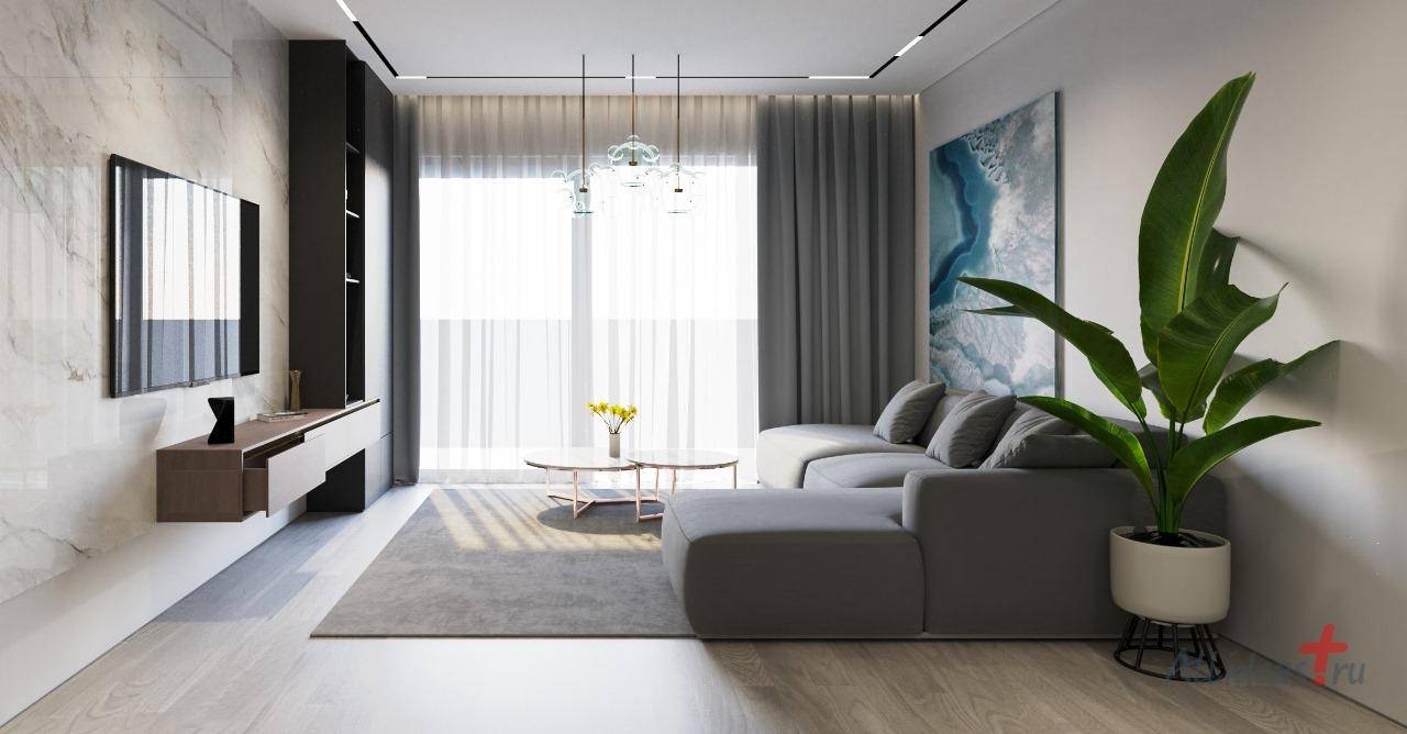 Modernes Wohnzimmer mit großem Sofa, Marmorwand und bodentiefen Fenstern für viel Licht.