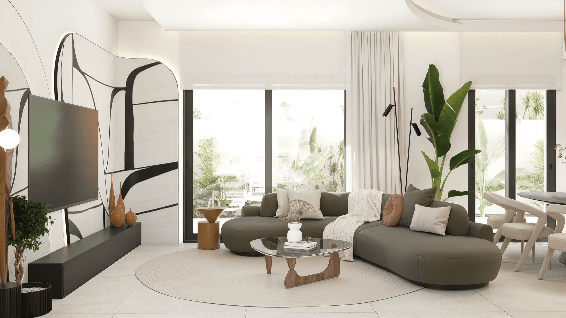 Helles Wohnzimmer mit bequemer Couch, stilvoller Dekoration und Blick ins Grüne durch große Fenster.